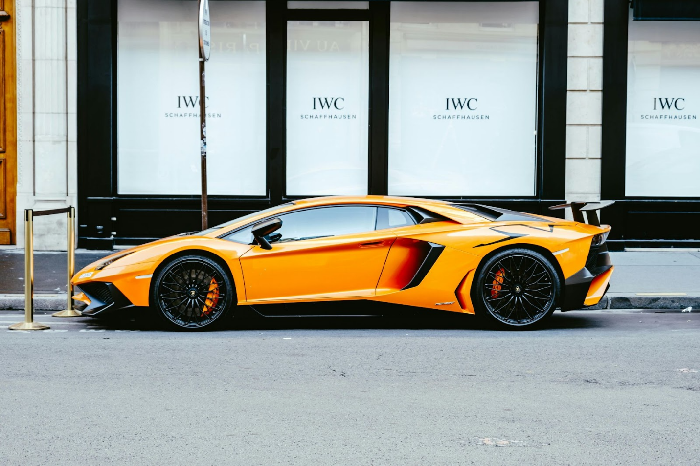 an orange colored lamborghini huracan