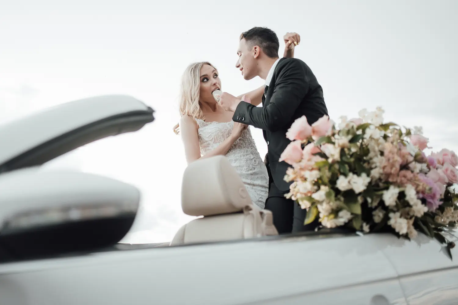 happy-authentic-candid-couple-in-a-convertible-car